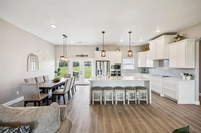 a view of a dining room with furniture