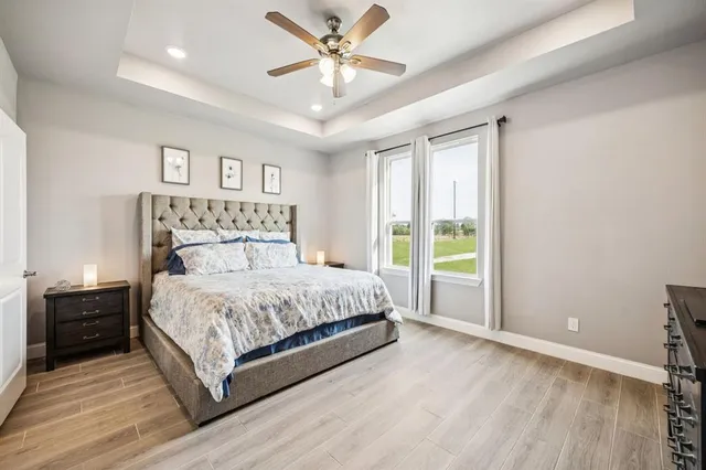 a kitchen with a refrigerator and a sink
