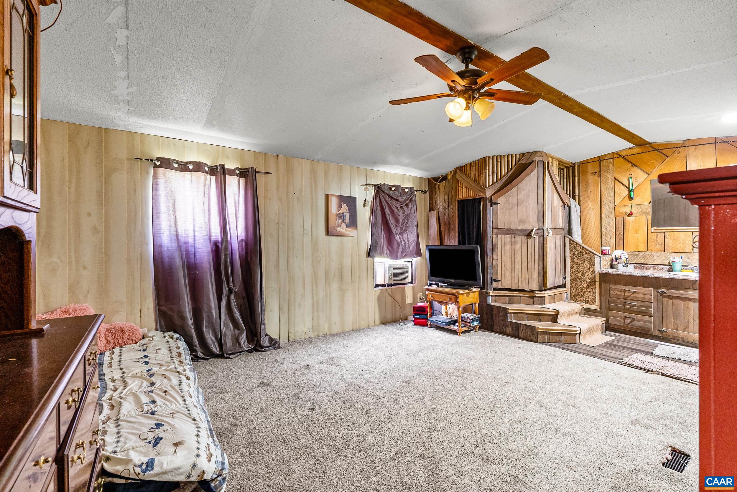386 Cub Creek Road Appomattox, VA 24522 - Photo 11 of 44 a view of a room with gym equipment
