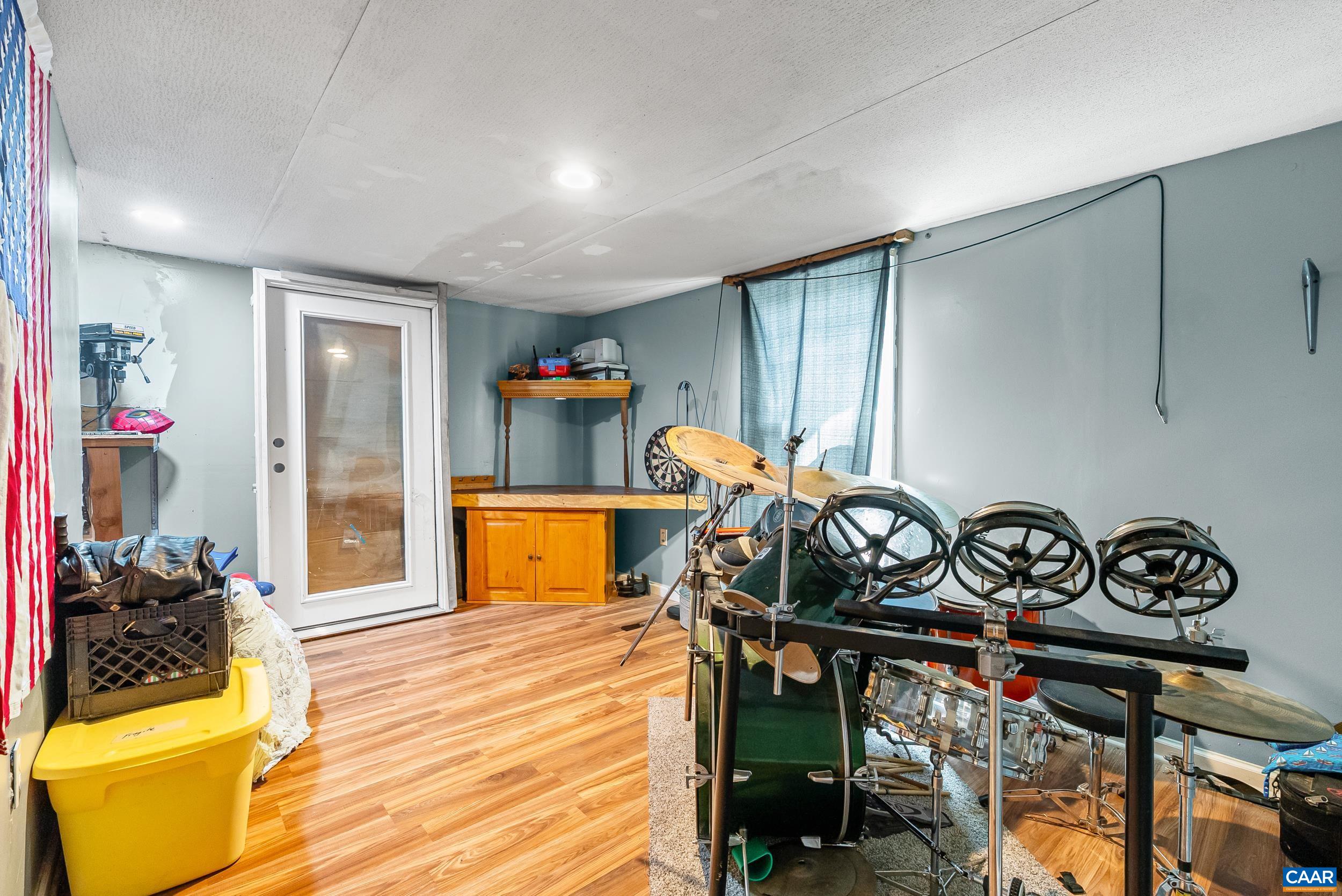386 Cub Creek Road Appomattox, VA 24522 - Photo 21 of 44 a view of a room with gym equipment