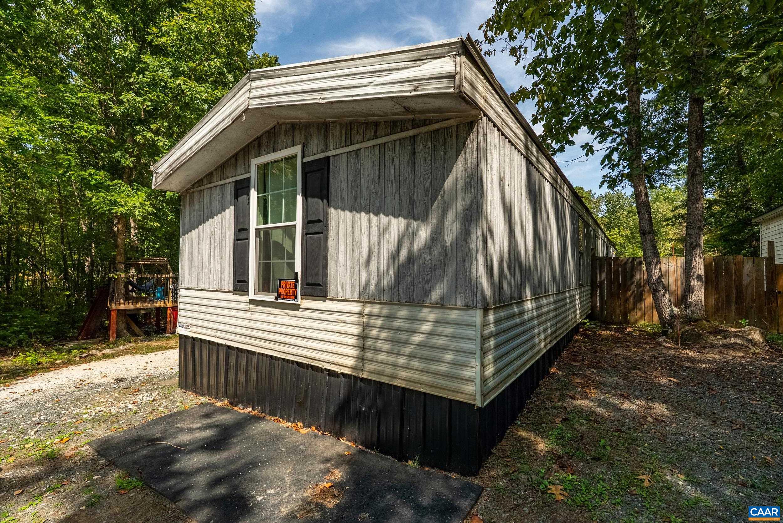 386 Cub Creek Road Appomattox, VA 24522 - Photo 38 of 44 a view of house with a yard and wooden fence