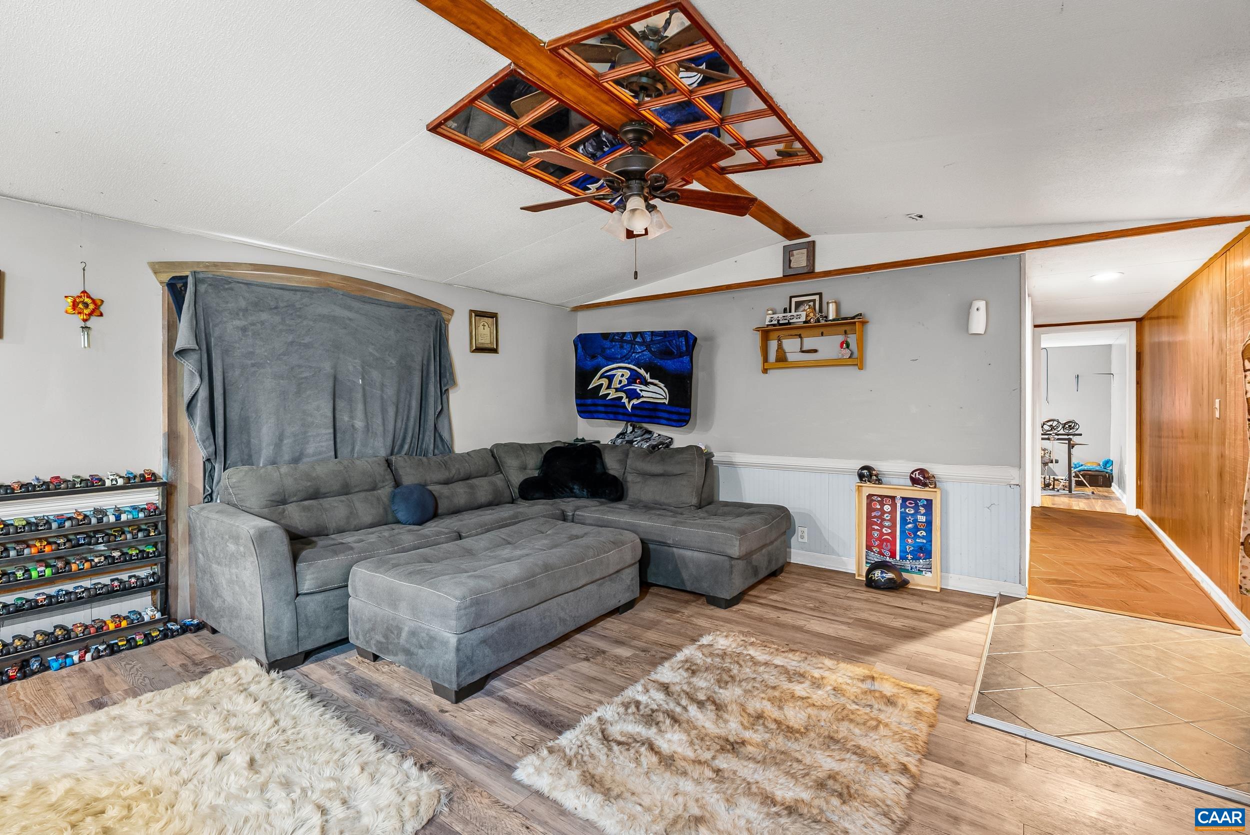 386 Cub Creek Road Appomattox, VA 24522 - Photo 5 of 44 a living room with furniture and a flat screen tv