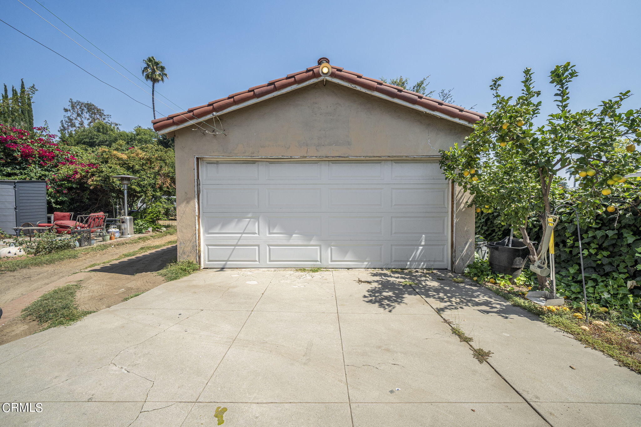 375 West Duarte Road Arcadia, CA 91007 - Photo 12 of 13 a white house with tree in the background