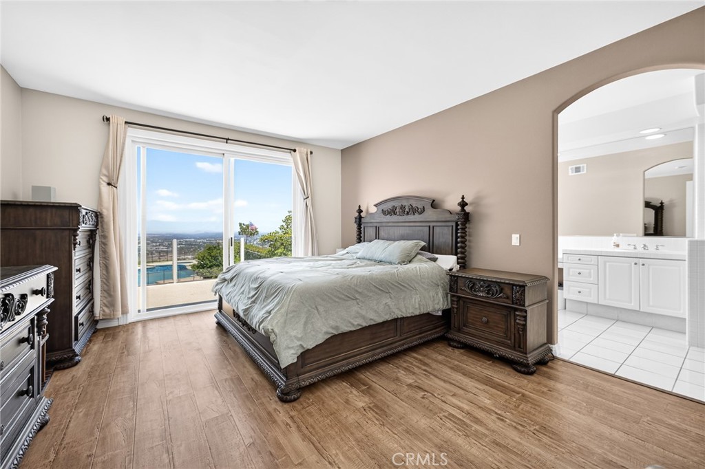 16318 Sun Summit Drive Riverside, CA 92503 - Photo 10 of 47 Primary bedroom with view and balcony 16318 sun summit drive, riverside, california 92503