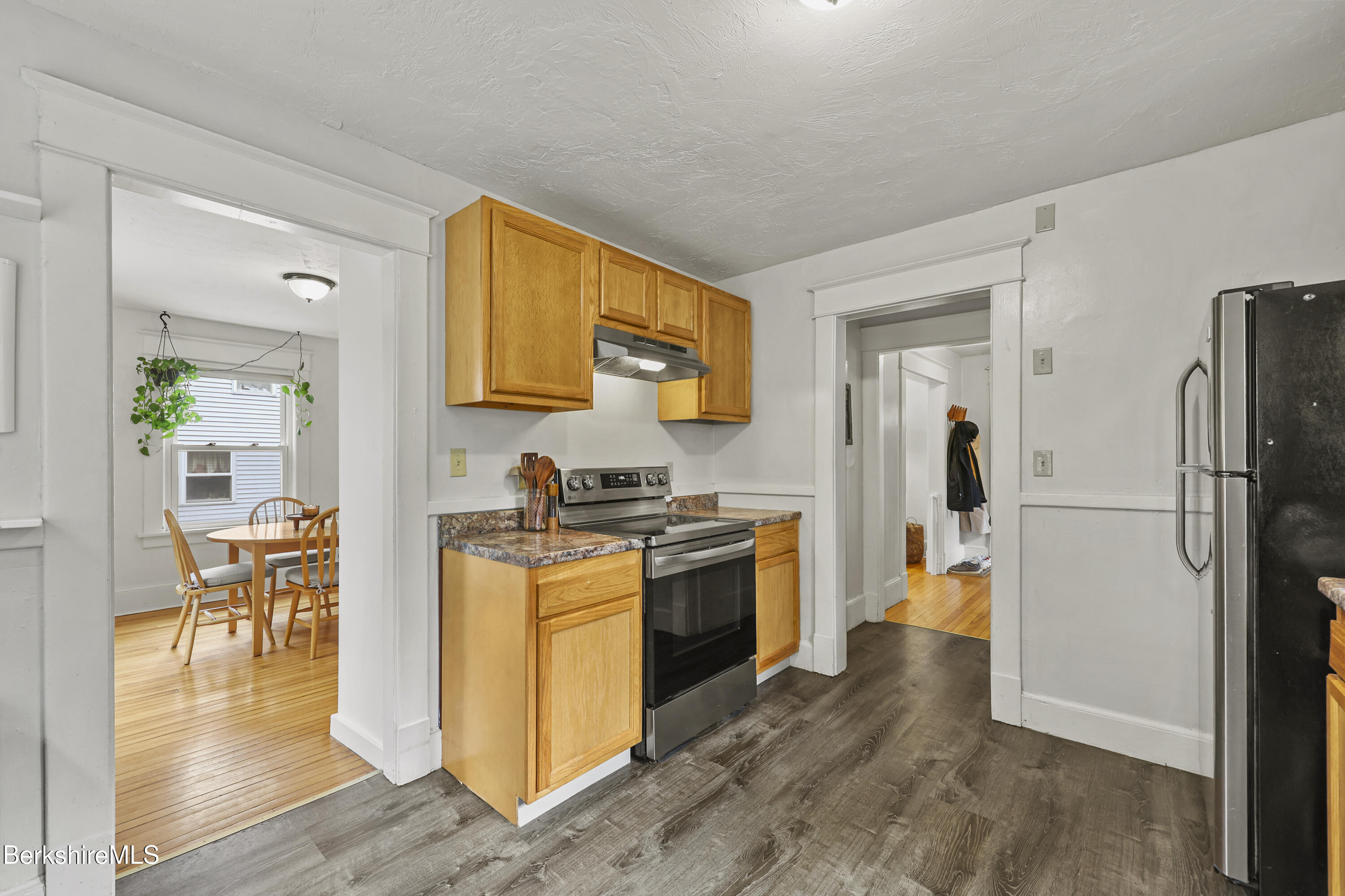 27 Morgan Street Pittsfield, MA 01201 - Photo 15 of 33 a kitchen with stainless steel appliances granite countertop a refrigerator stove top oven and sink