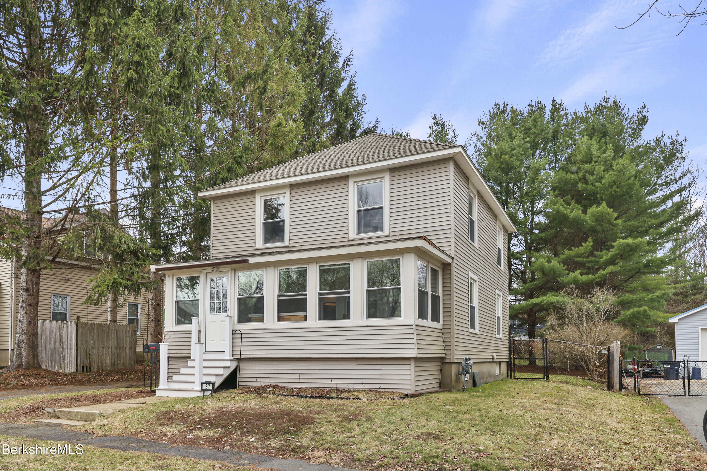 27 Morgan Street Pittsfield, MA 01201 - Photo 2 of 33 a front view of a house with a garden