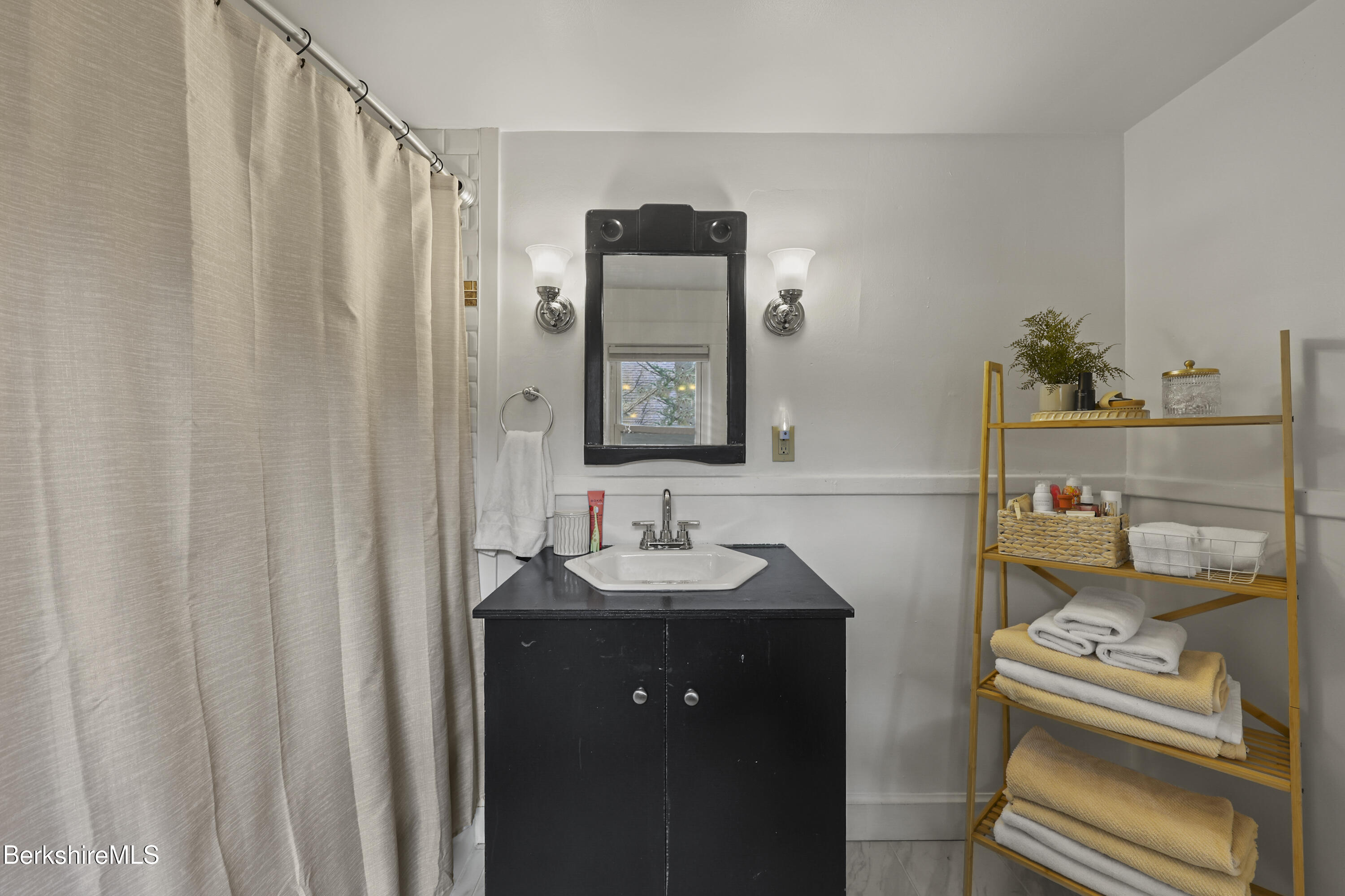27 Morgan Street Pittsfield, MA 01201 - Photo 25 of 33 a bathroom with a sink vanity and toilet