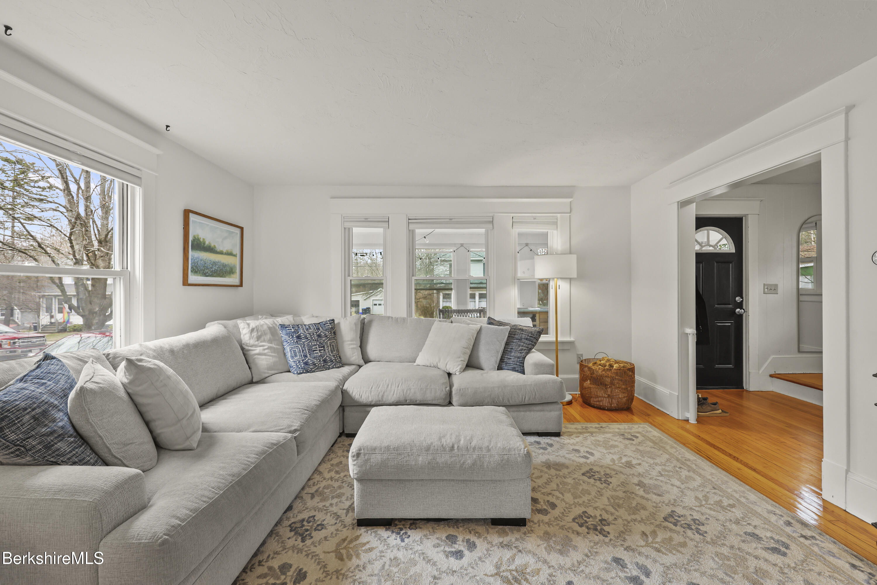 27 Morgan Street Pittsfield, MA 01201 - Photo 7 of 33 a living room with furniture and a large window