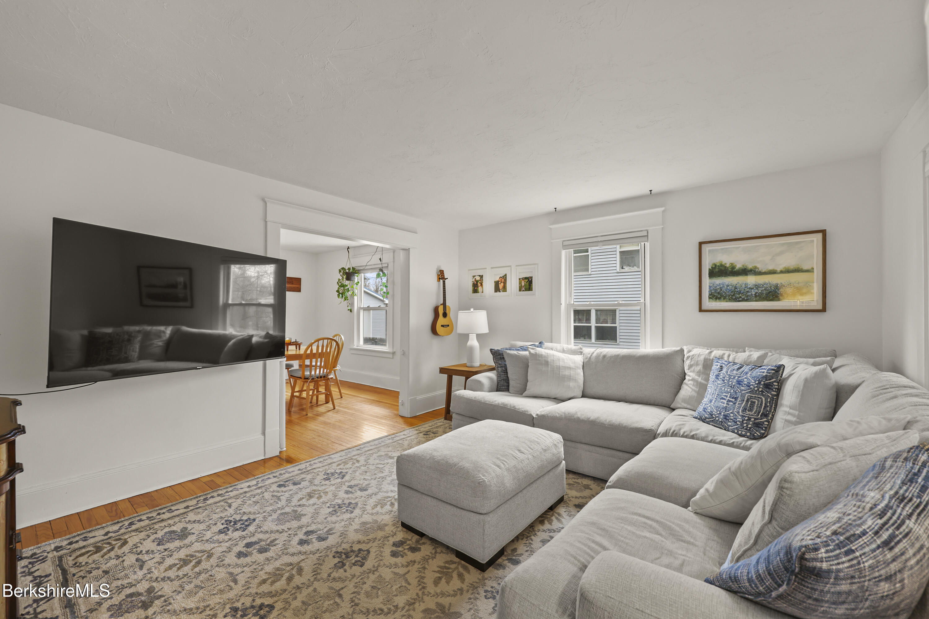27 Morgan Street Pittsfield, MA 01201 - Photo 8 of 33 a living room with furniture and a flat screen tv