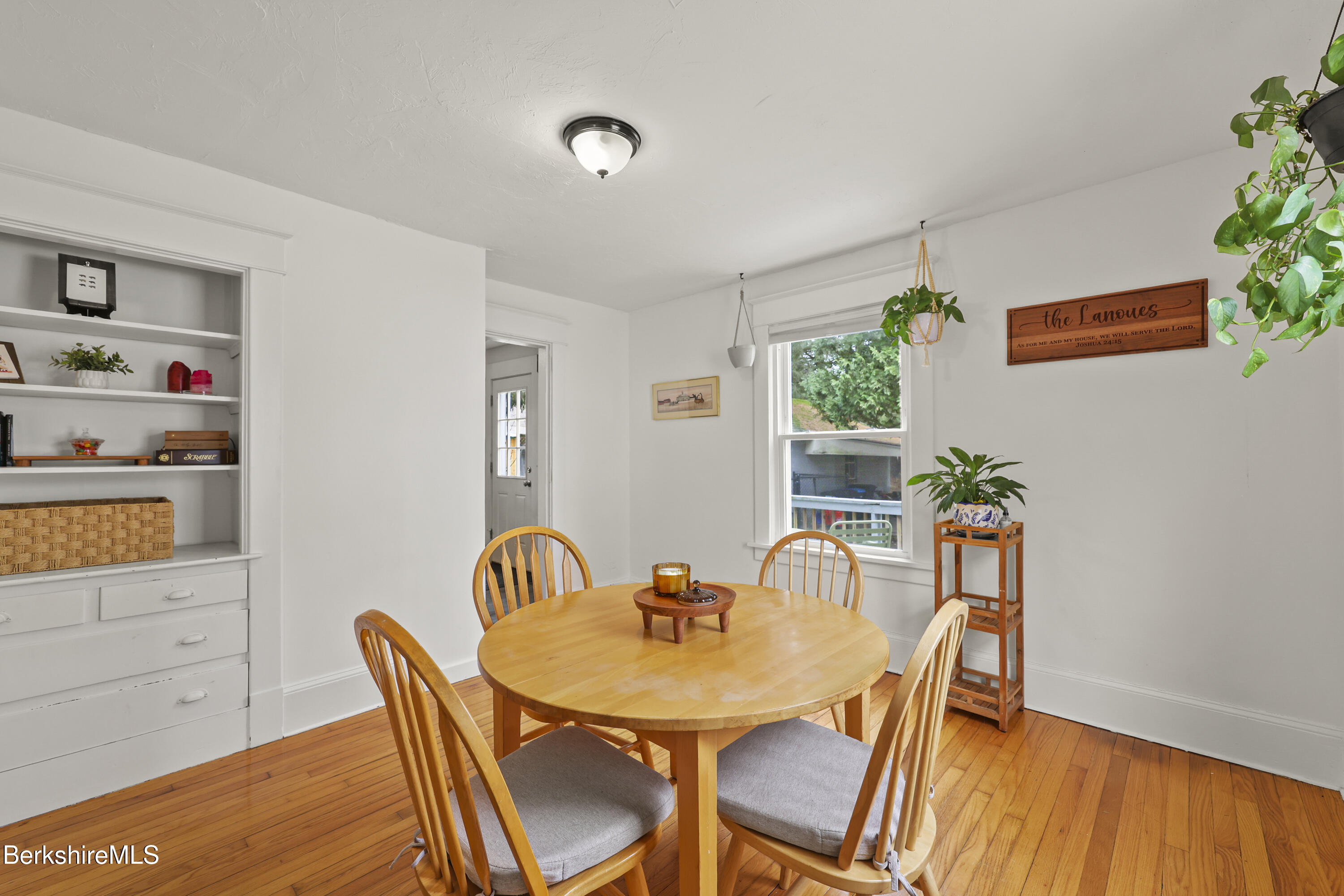 27 Morgan Street Pittsfield, MA 01201 - Photo 9 of 33 a view of a dining room with furniture and wooden floor