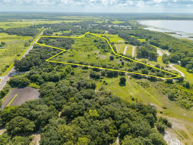 a view of a houses with a lake