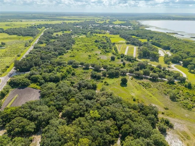 a view of a lake with a city