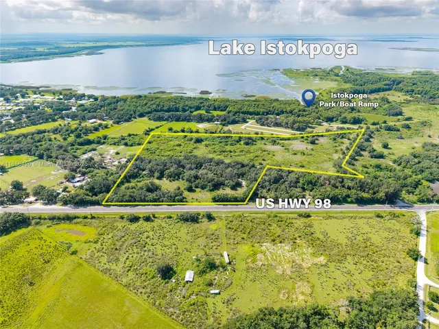 a view of swimming pool with a yard