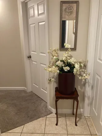 a room with a table and chairs