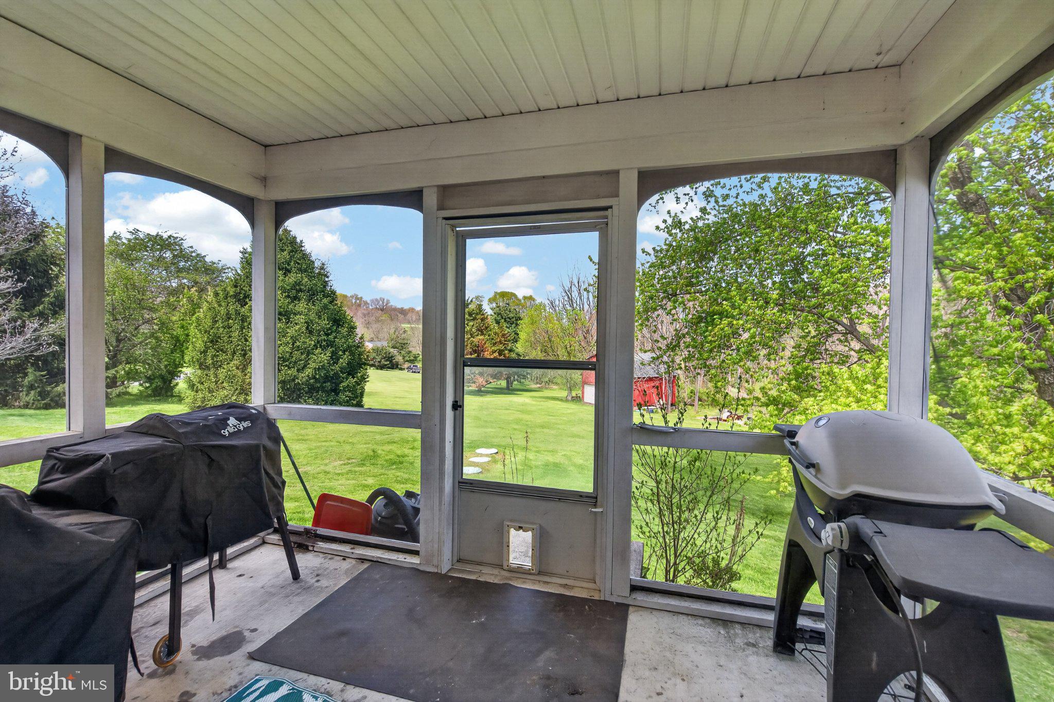45 Latham Road Nottingham, PA 19362 - Photo 14 of 80 Serene porch with lush green views.