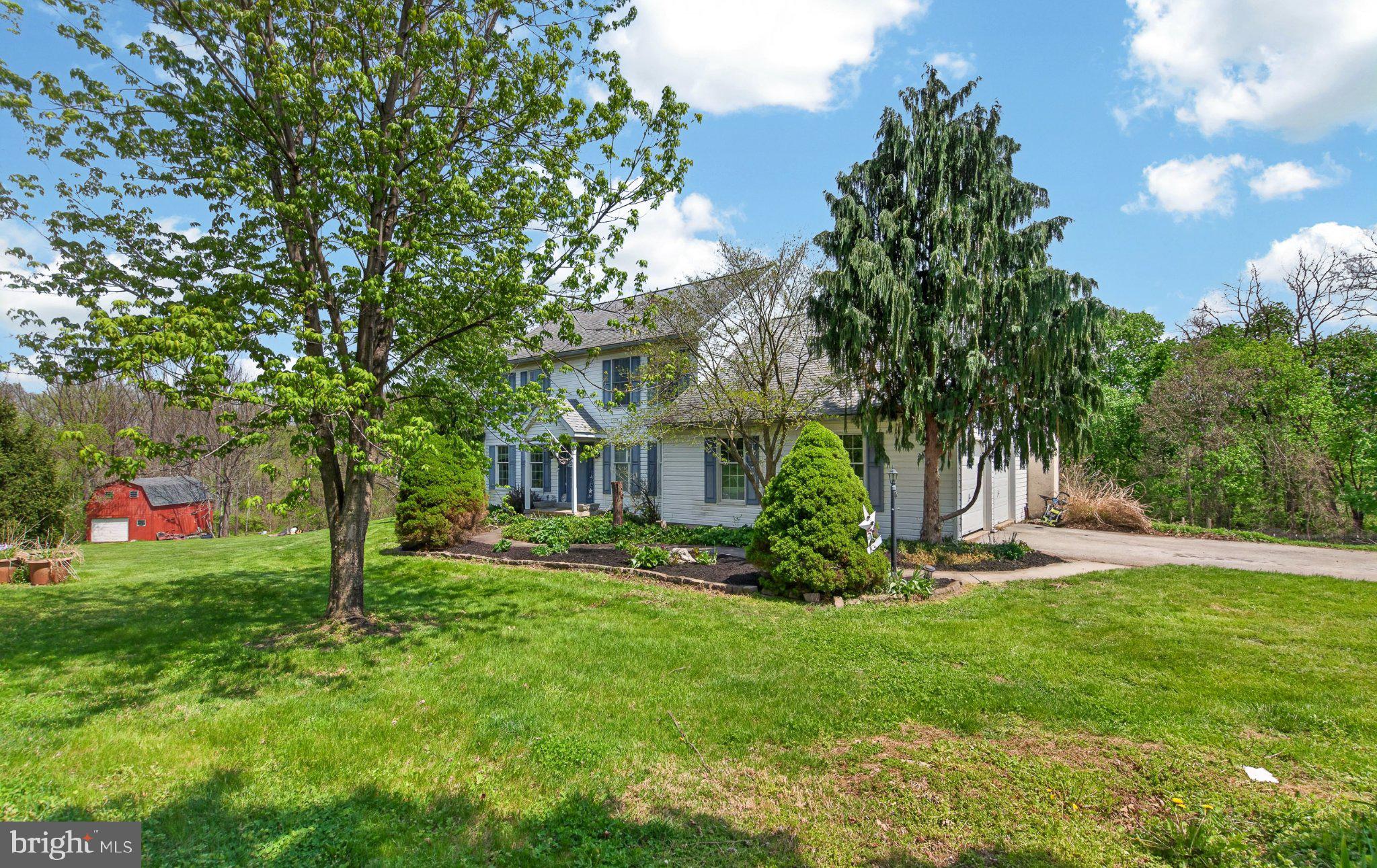 45 Latham Road Nottingham, PA 19362 - Photo 6 of 80 Charming home amidst lush greenery.