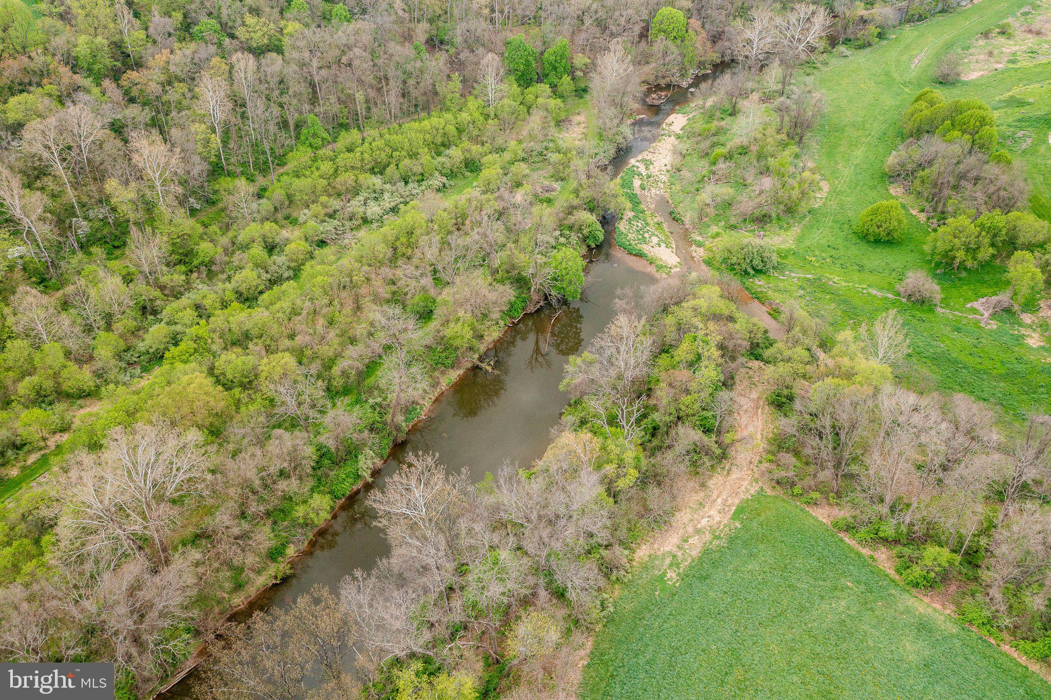 45 Latham Road Nottingham, PA 19362 - Photo 68 of 80 Serene river winding through lush greenery.