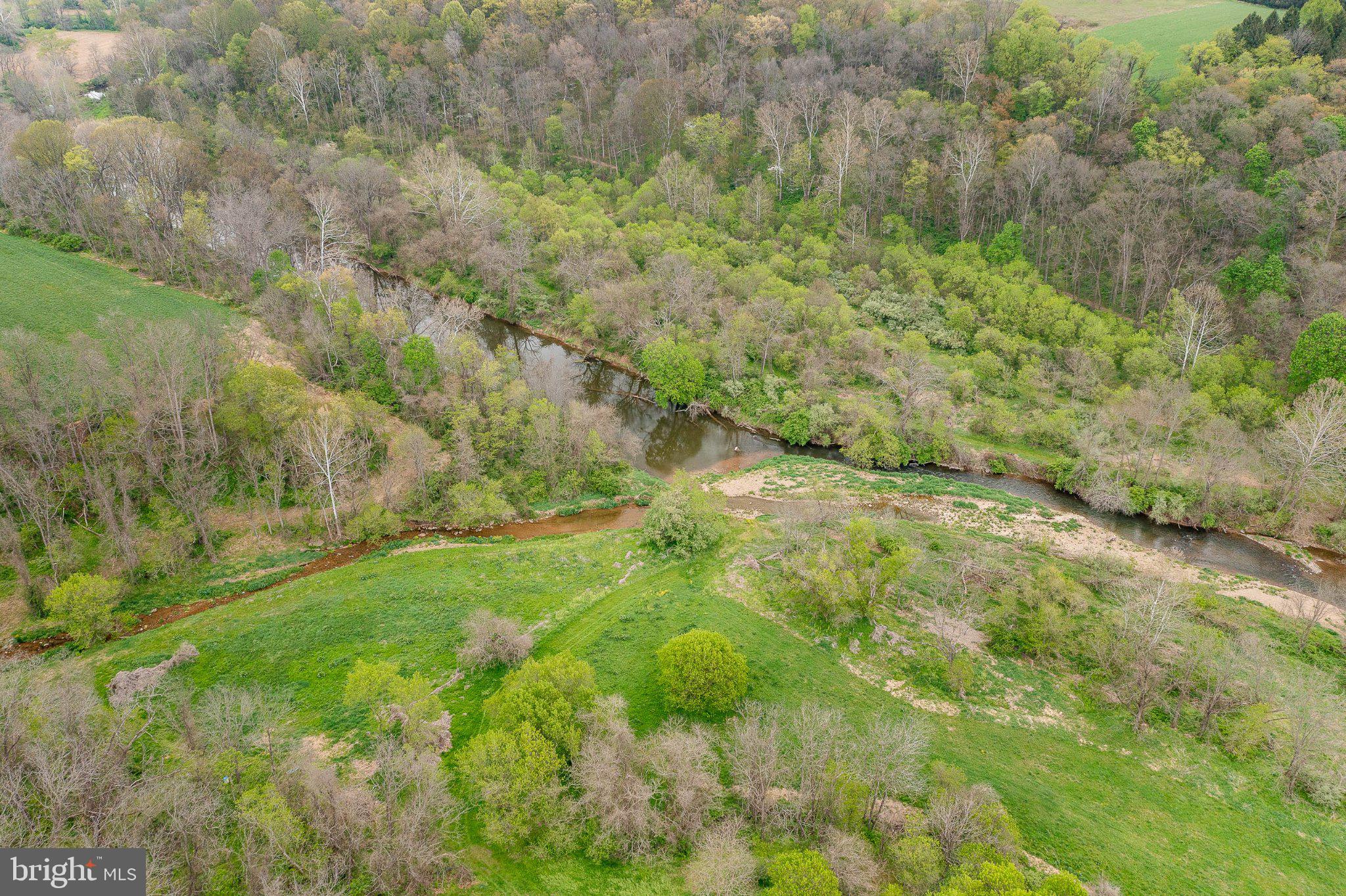 45 Latham Road Nottingham, PA 19362 - Photo 76 of 80 Serene river winding through lush greens.