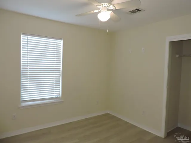 en empty room with a window