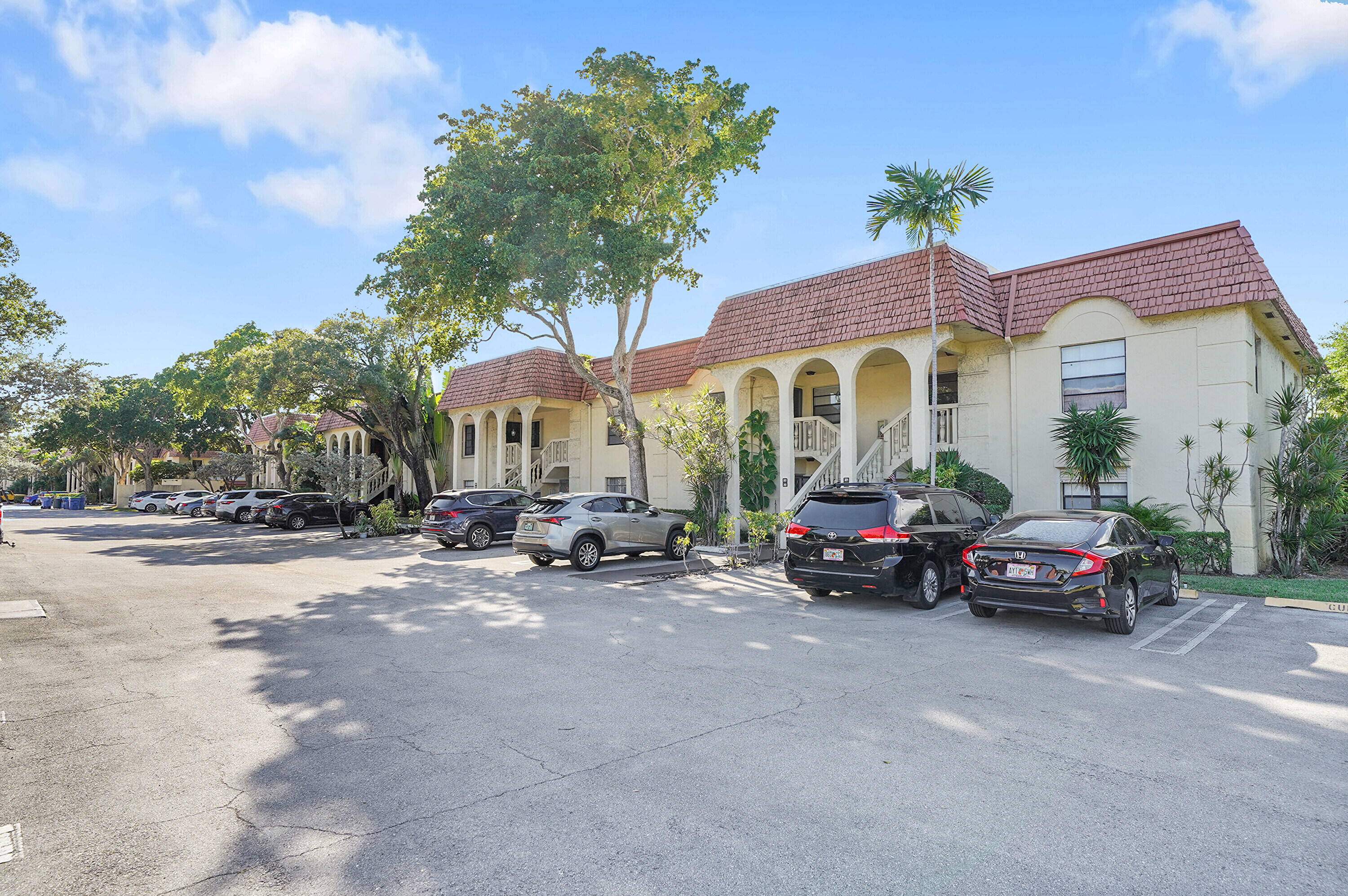 a view of a car is parked in front of a house