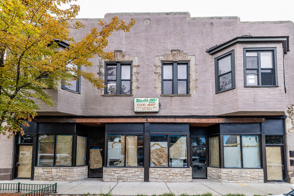 2448 South Oakley Avenue, Unit 2F Chicago, IL 60608 - Photo 1 of 14 a view of a building with a outdoor space