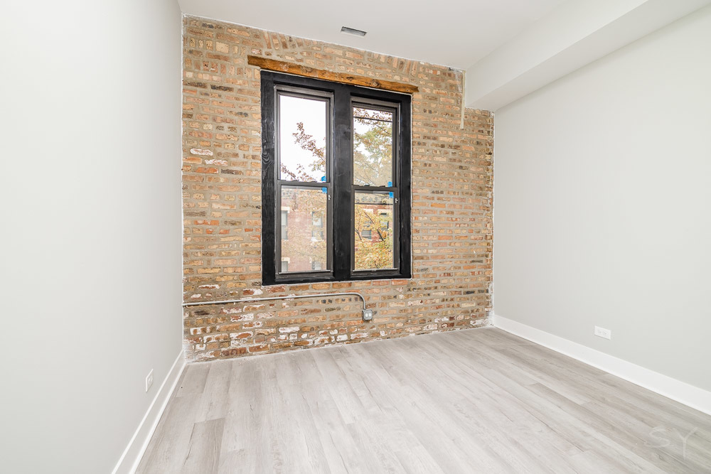2448 South Oakley Avenue, Unit 2F Chicago, IL 60608 - Photo 8 of 14 a view of entrance door of the house