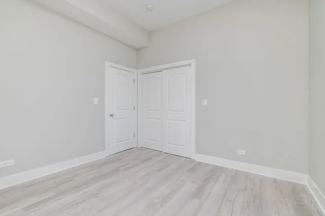 a bathroom with a toilet and a bathtub
