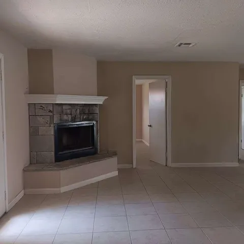 a view of a livingroom with a fireplace