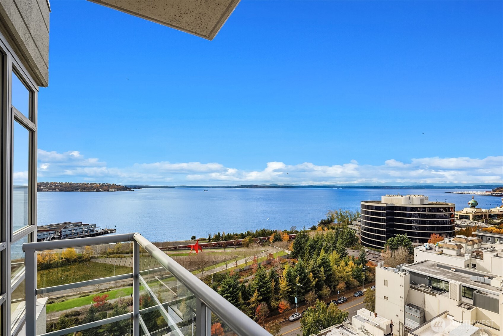 2929 1st Avenue, Unit 1200 Seattle, WA 98121 - Photo 14 of 23 a view of a lake with a building in the background