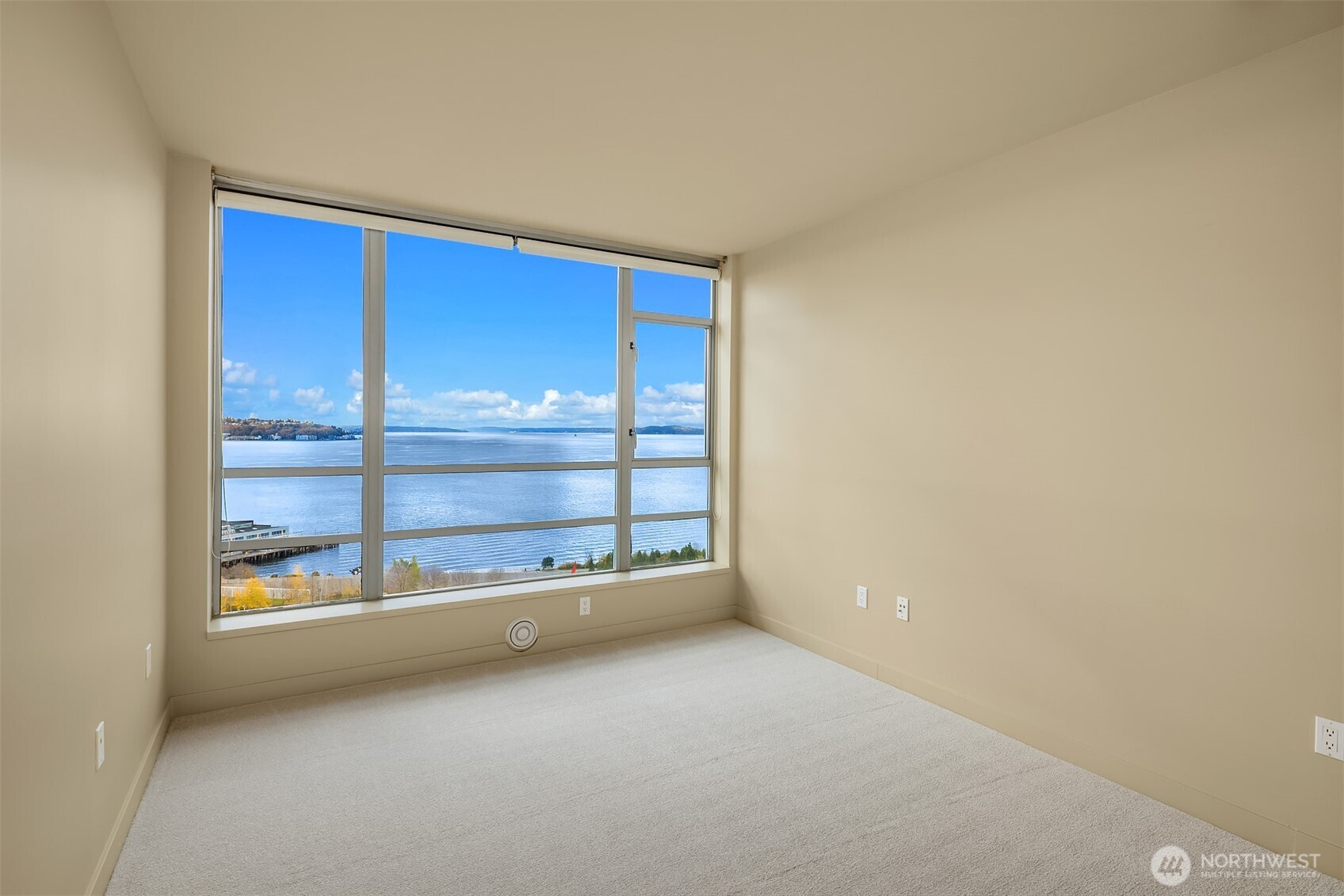 2929 1st Avenue, Unit 1200 Seattle, WA 98121 - Photo 9 of 23 a view of an empty room with a window