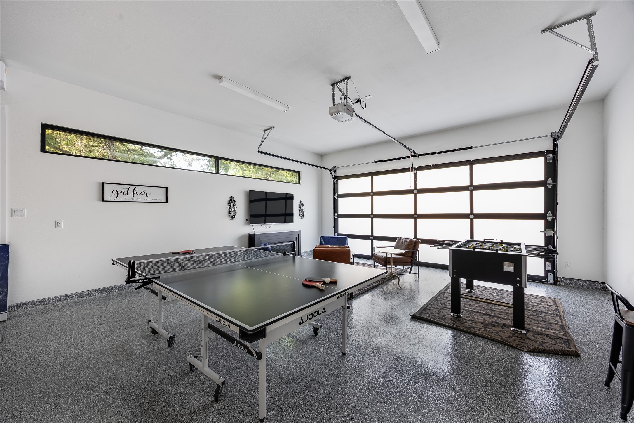 3138 Chisholm Trail Austin, TX 78734 - Photo 23 of 40 a living room with pool table and windows