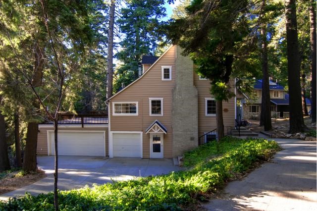 920 Oak Road Lake Arrowhead, CA 92385 - Photo 1 of 1 a front view of a house with a yard