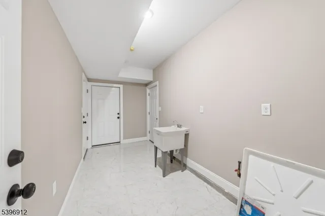 a view of a room with racks on the wall