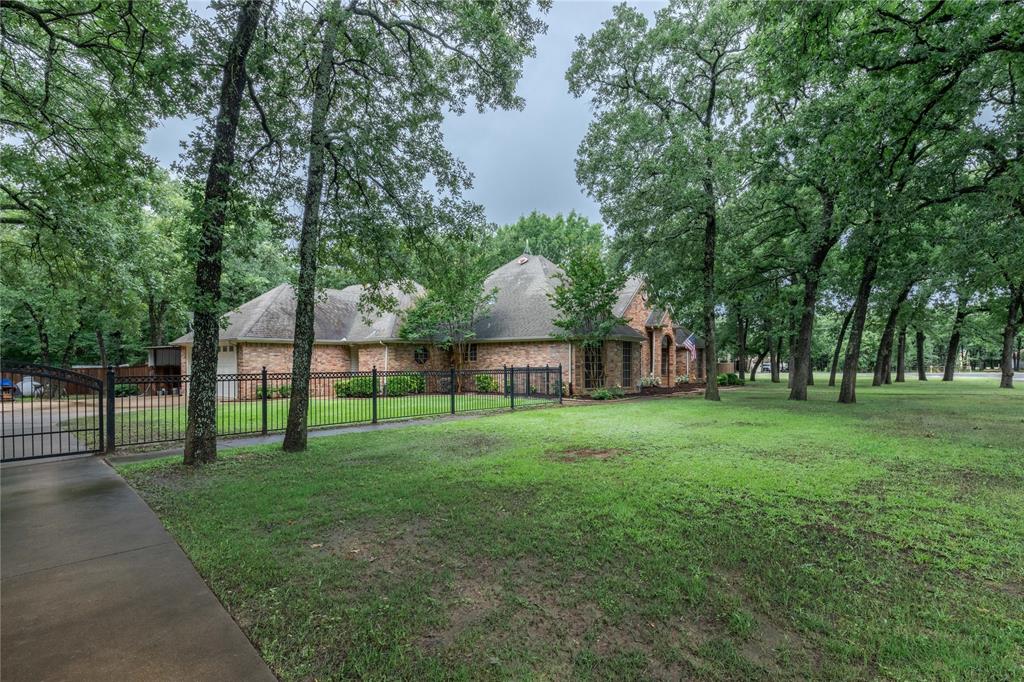 320 Rustic Oaks Road Combine, TX 75159 - Photo 10 of 40 View of yard featuring a gate