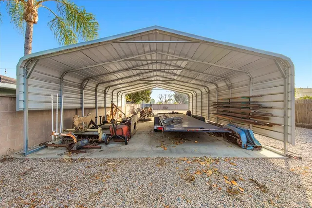 a view of a car park in front of house