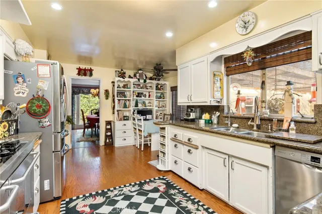 a view of a chairs and table in a patio