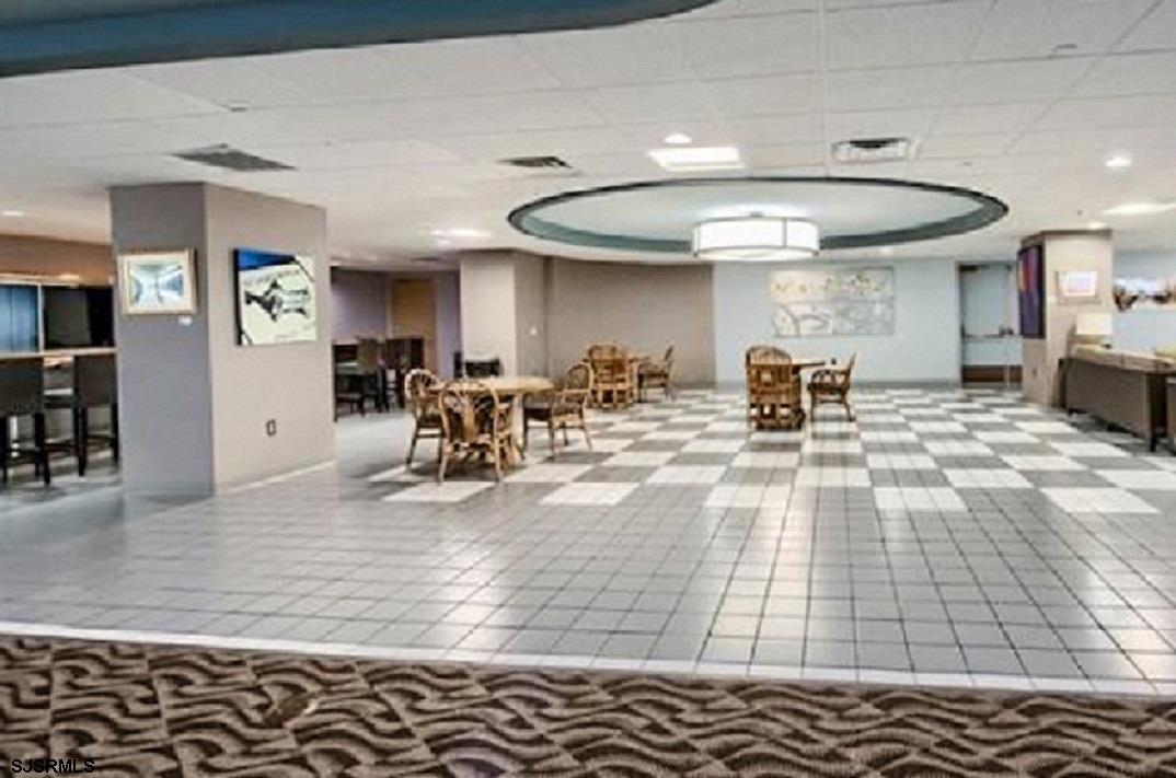 3101 Boardwalk, Unit 1402A1 Atlantic City, NJ 08401 - Photo 20 of 31 a view of a living room and kitchen