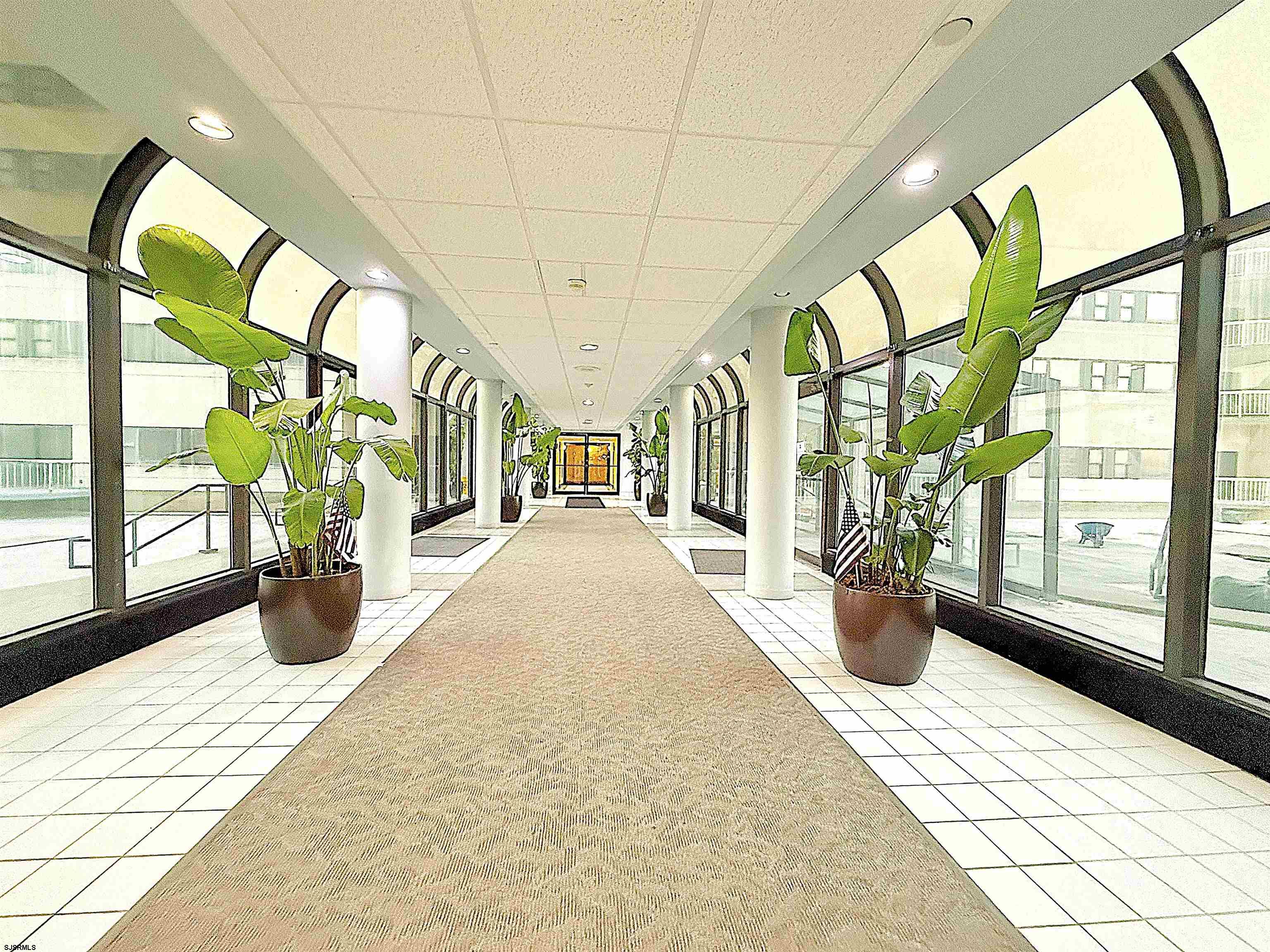 3101 Boardwalk, Unit 1402A1 Atlantic City, NJ 08401 - Photo 22 of 31 a living room filled with furniture