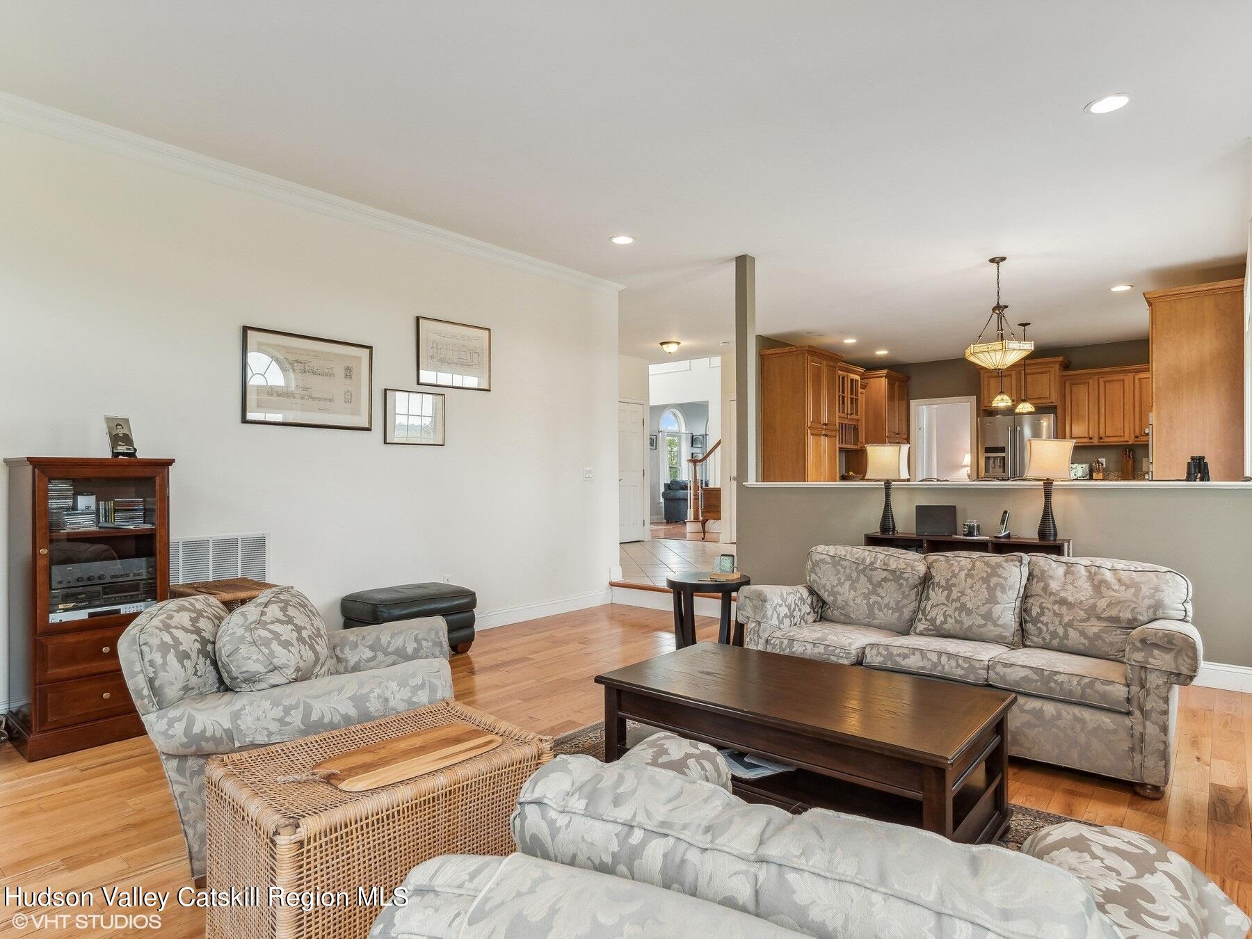 39 Ridgeline Drive Poughkeepsie, NY 12603 - Photo 14 of 35 a living room with furniture and a view of kitchen