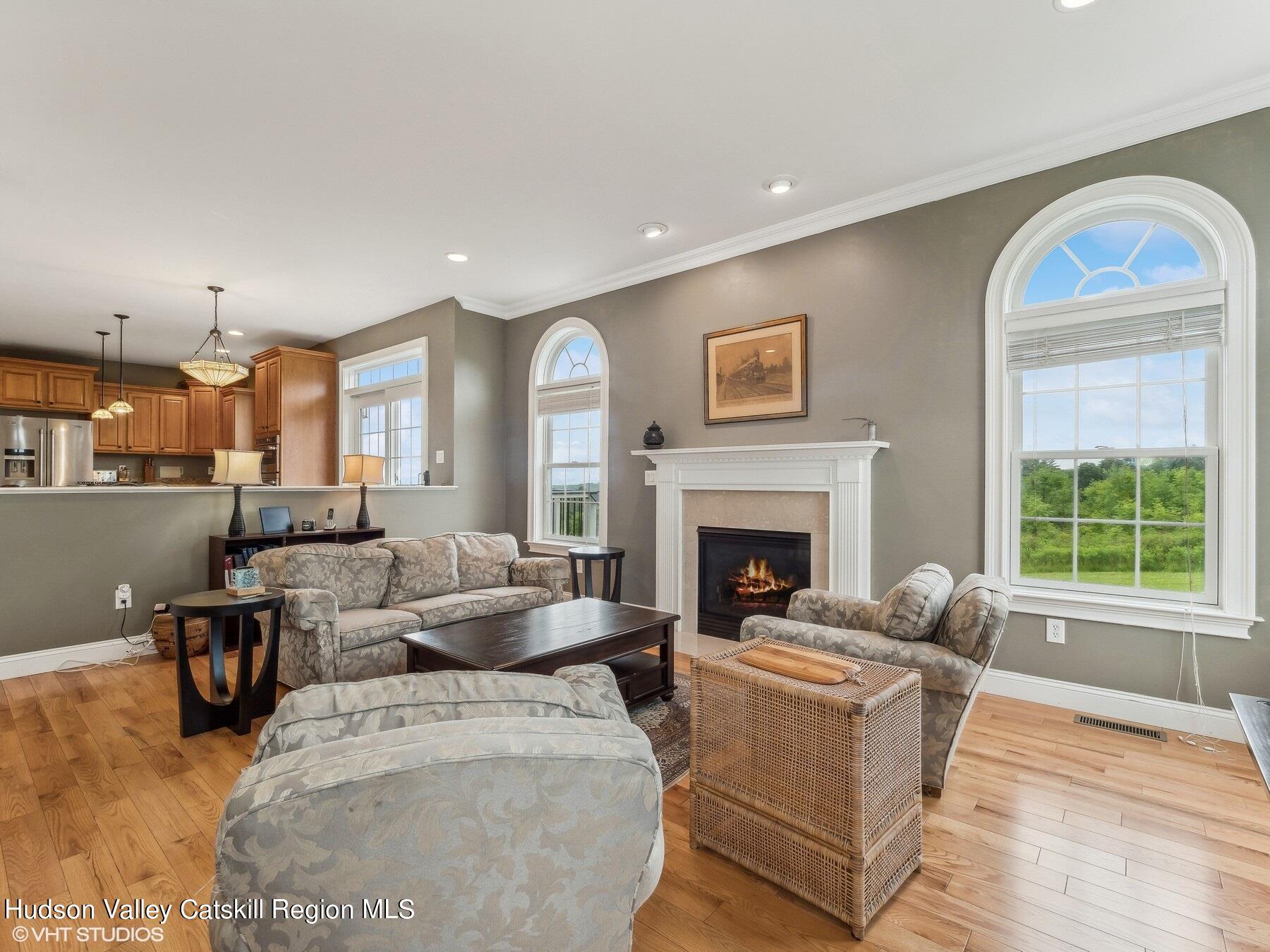 39 Ridgeline Drive Poughkeepsie, NY 12603 - Photo 15 of 35 a living room with furniture and a fireplace