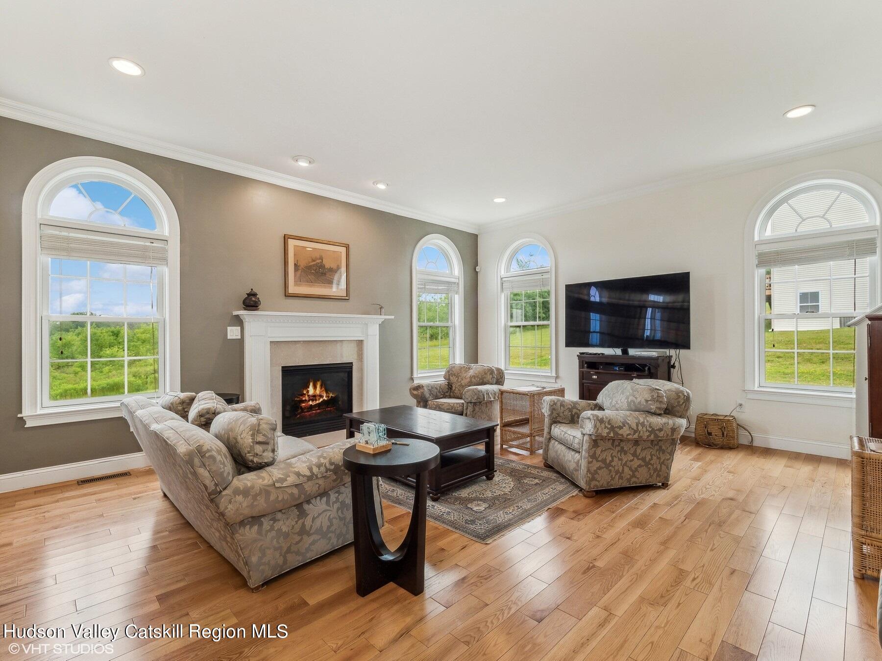 39 Ridgeline Drive Poughkeepsie, NY 12603 - Photo 16 of 35 a living room with furniture fireplace and a large window