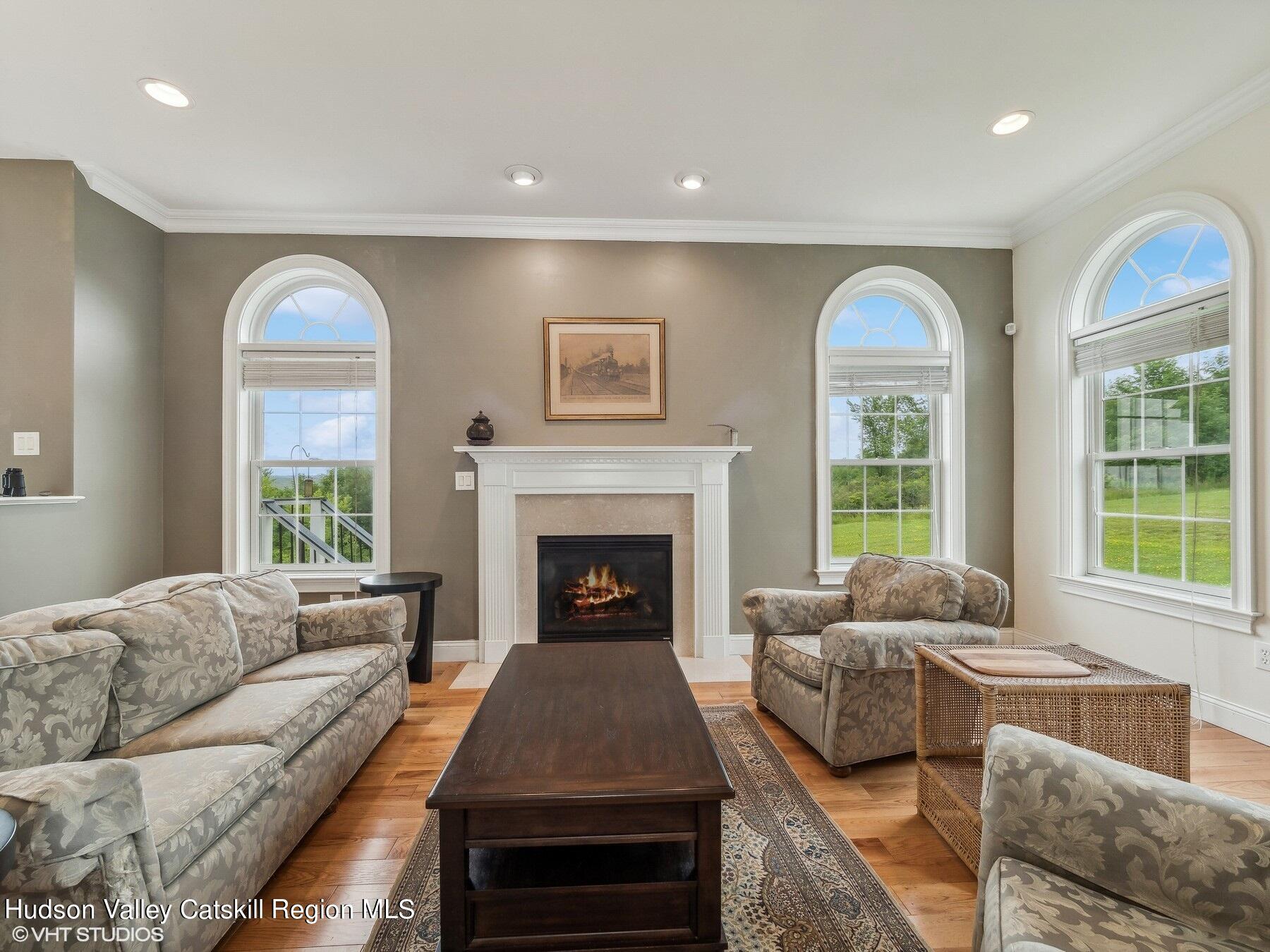 39 Ridgeline Drive Poughkeepsie, NY 12603 - Photo 17 of 35 a living room with furniture and a fireplace