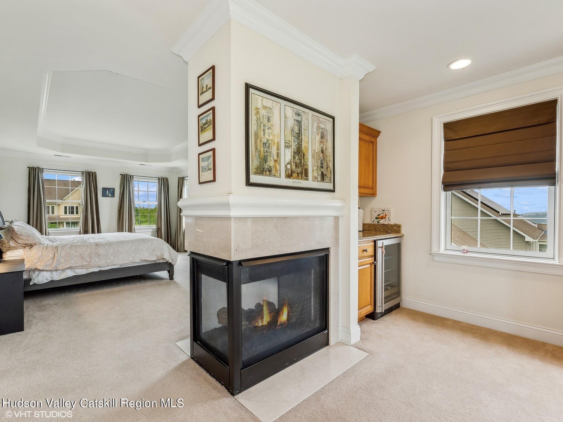 39 Ridgeline Drive Poughkeepsie, NY 12603 - Photo 19 of 35 a living room with furniture and a fireplace