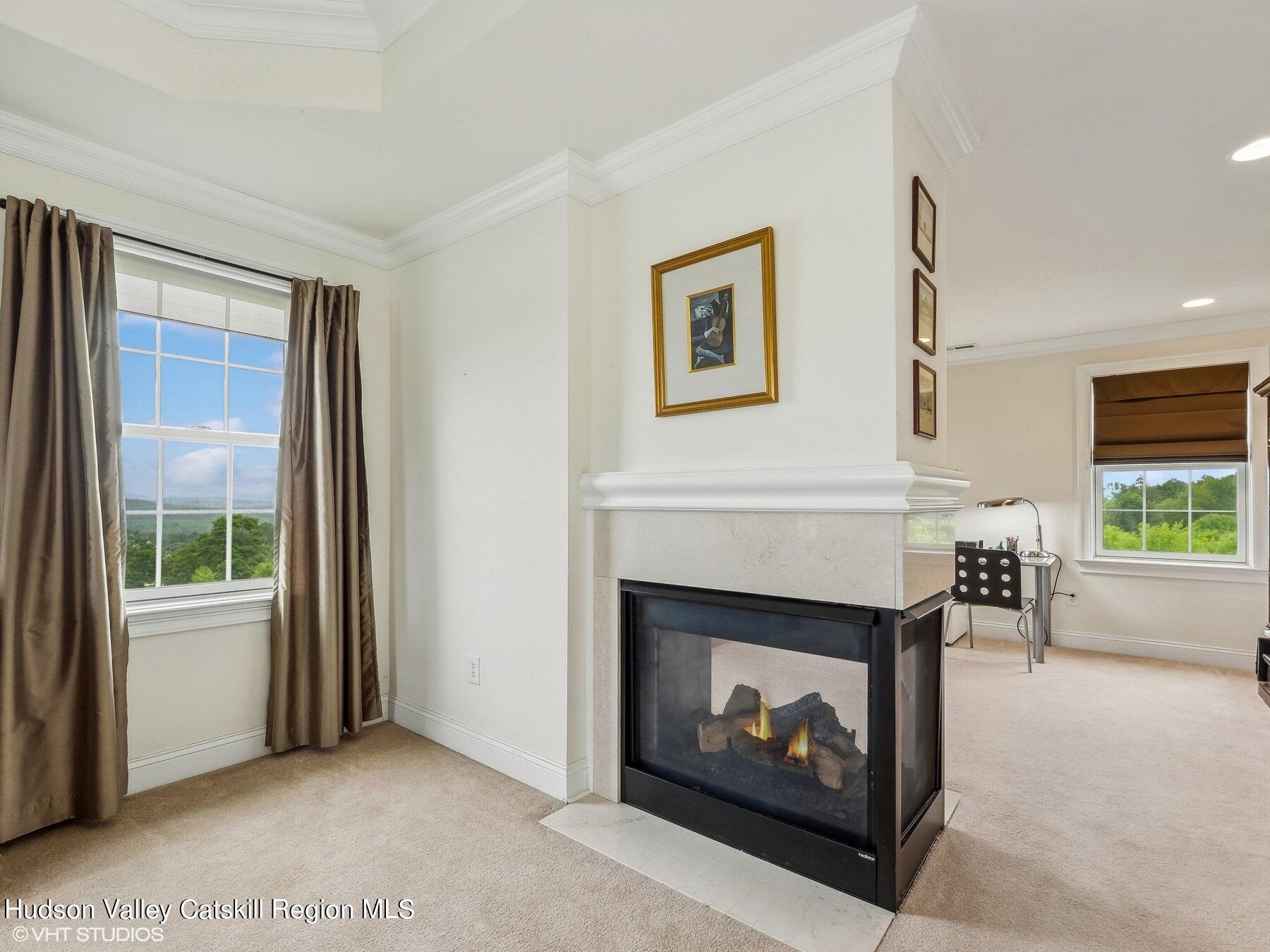 39 Ridgeline Drive Poughkeepsie, NY 12603 - Photo 21 of 35 a living room with furniture and a fireplace