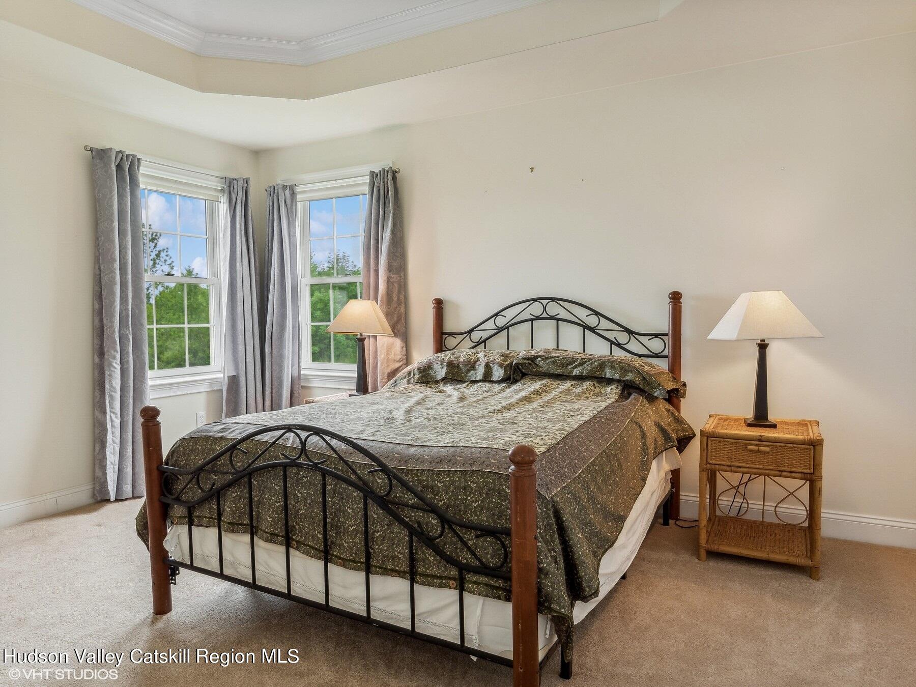 39 Ridgeline Drive Poughkeepsie, NY 12603 - Photo 24 of 35 a bedroom with a bed a lamp and window