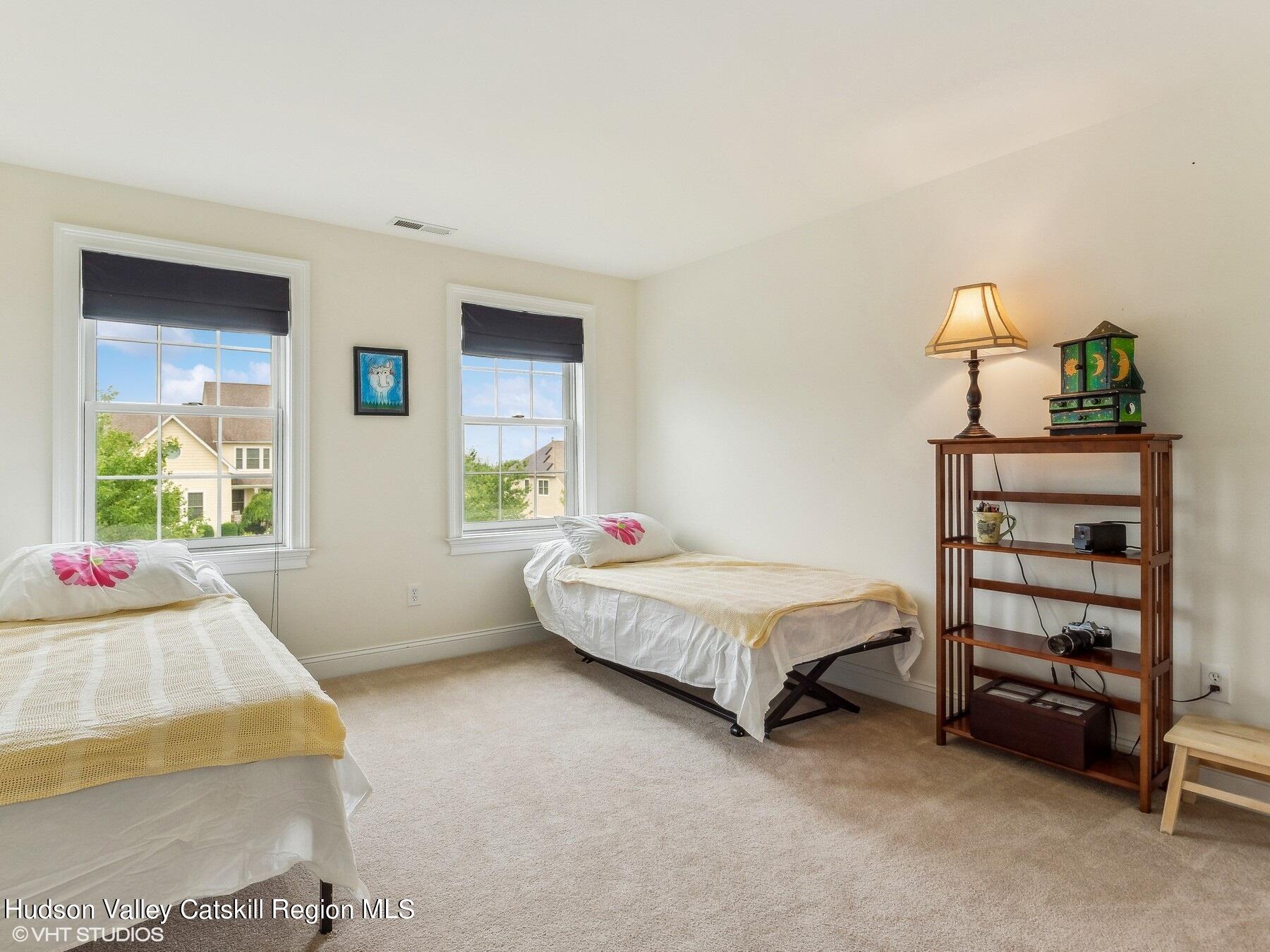 39 Ridgeline Drive Poughkeepsie, NY 12603 - Photo 25 of 35 a bedroom with a bed and a window