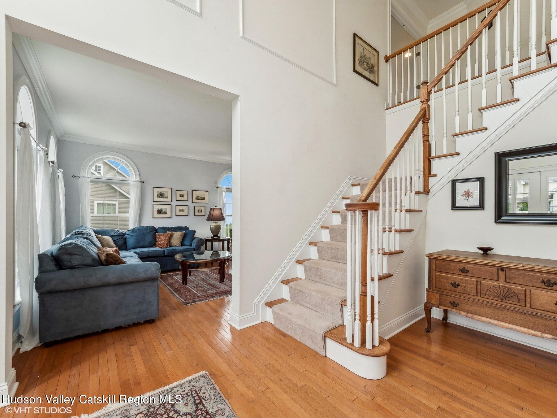 39 Ridgeline Drive Poughkeepsie, NY 12603 - Photo 5 of 35 a livingroom with furniture staircase and a living room