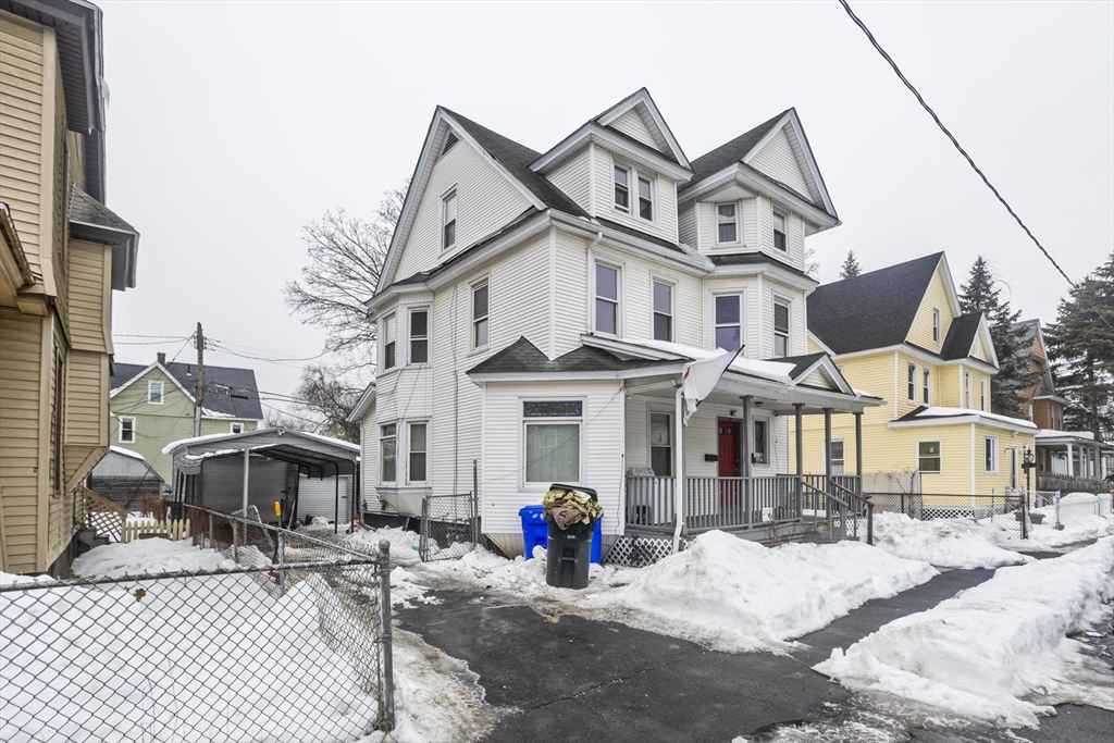a view of a street with sitting area