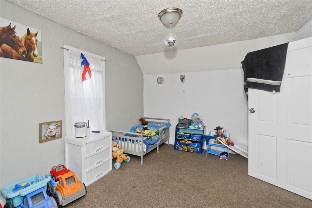 52 Orlando Street Springfield, MA 01108 - Photo 13 of 29 a children room with toys