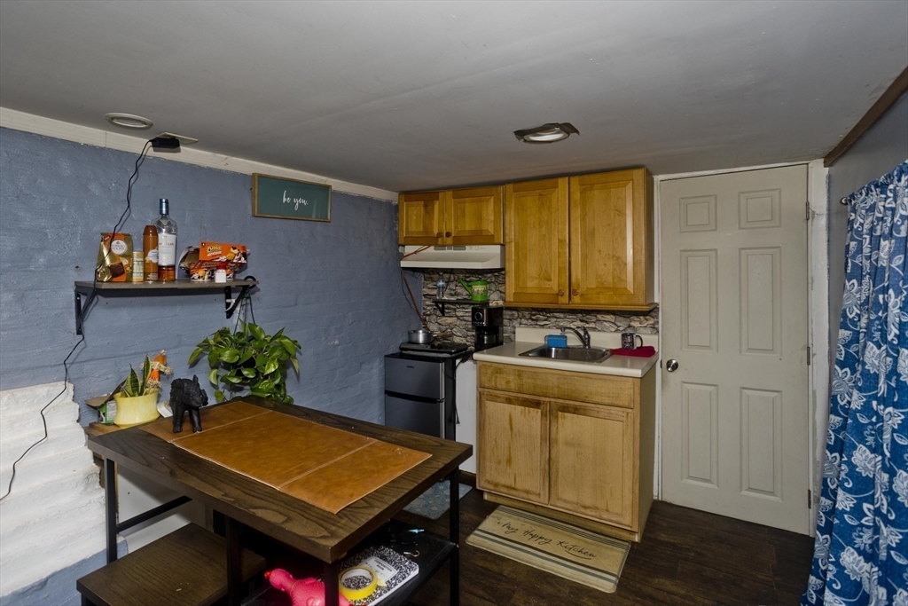 52 Orlando Street Springfield, MA 01108 - Photo 27 of 29 a room with furniture pool table table and window
